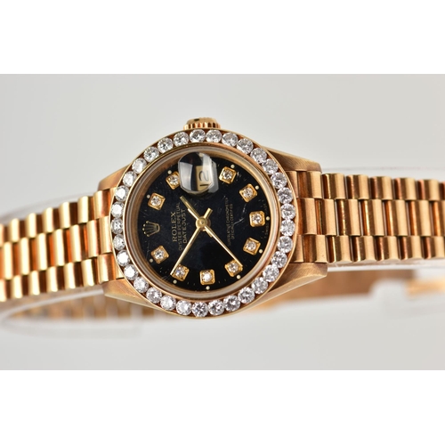 119 - AN 18CT YELLOW GOLD AUTOMATIC ROLEX OYSTER PERPETUAL DATEJUST WITH DIAMOND DOT DIAL, fitted with an ... 