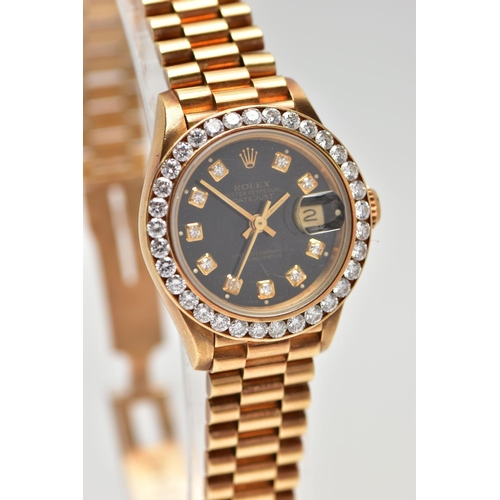 119 - AN 18CT YELLOW GOLD AUTOMATIC ROLEX OYSTER PERPETUAL DATEJUST WITH DIAMOND DOT DIAL, fitted with an ... 