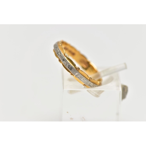 121 - A MID 20TH CENTURY 22CT YELLOW GOLD AND WHITE METAL WEDDING BAND, the ring designed as a central eng... 