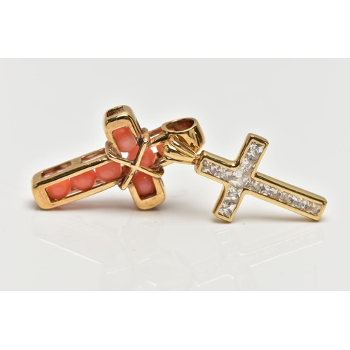 124 - TWO YELLOW METAL GEM SET CROSS PENDANTS, to include a cross pendant set with coral beads and a cross... 