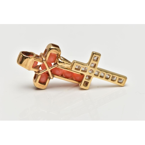 124 - TWO YELLOW METAL GEM SET CROSS PENDANTS, to include a cross pendant set with coral beads and a cross... 