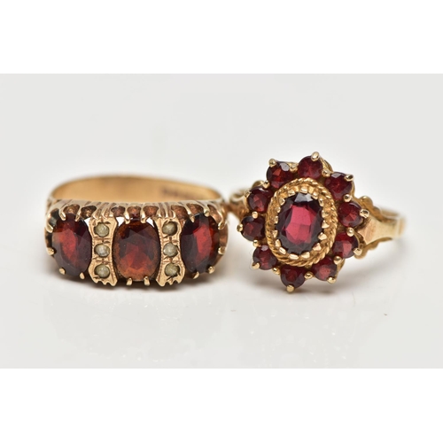 128 - TWO 9CT GOLD GARNET RINGS, to included a garnet three stone ring set with three oval cut garnets, in... 