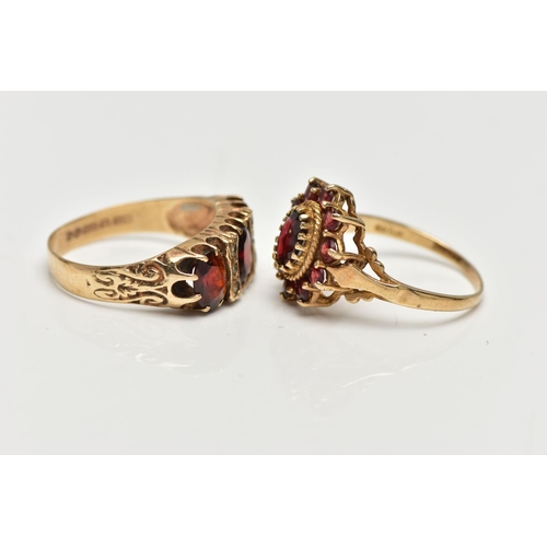 128 - TWO 9CT GOLD GARNET RINGS, to included a garnet three stone ring set with three oval cut garnets, in... 