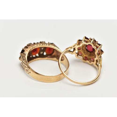 128 - TWO 9CT GOLD GARNET RINGS, to included a garnet three stone ring set with three oval cut garnets, in... 