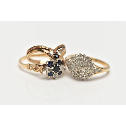 130 - THREE 9CT GOLD DIAMOND AND GEM SET RINGS, to include a single cut diamond tiered cluster ring, estim... 