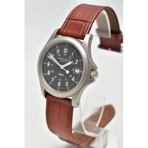 140 - A HAMILTON QUARTZ WRISTWATCH, the black dial, with white Arabic numerals, illuminous white hands, da... 