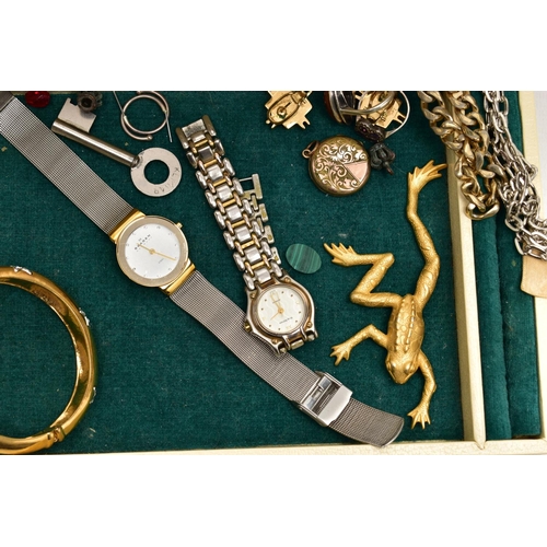 142 - AN ASSORTMENT OF JEWELLERY, to include an early 20th century gold front and back locket, a white met... 