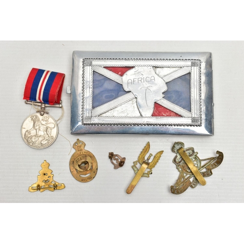 158 - MILITARY ITEMS AS FOLLOWS, handmade white metal cigarette case, which has been heavily decorated wit... 