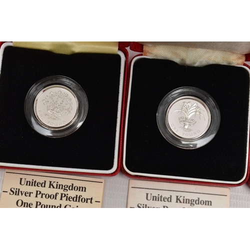 22 - ROYAL MINT BOXED SILVER PROOF PIEDFORT ONE POUND COINS 1984,1985,1986 all in Royal Mint cases with c... 