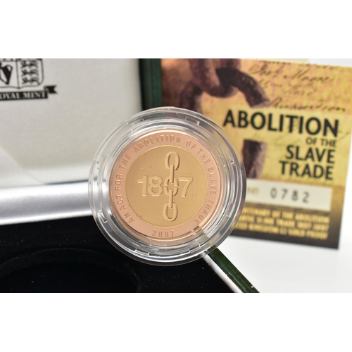 39 - A ROYAL MINT 2007 GOLD PROOF ABOLITION OF THE SLAVE TRADE TWO POUND COIN, with red and yellow gold f... 