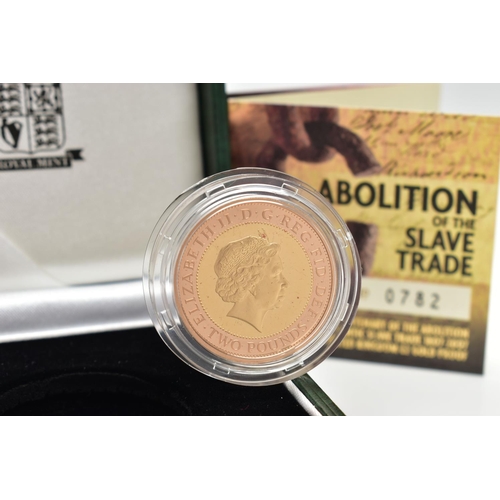 39 - A ROYAL MINT 2007 GOLD PROOF ABOLITION OF THE SLAVE TRADE TWO POUND COIN, with red and yellow gold f... 