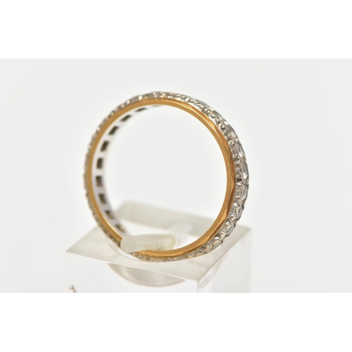 84 - A PASTE FULL ETERNITY RING, the circular cut paste full eternity band ring, with yellow metal edging... 