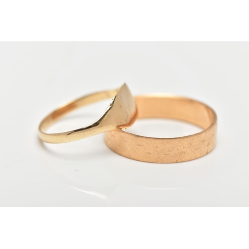 87 - TWO YELLOW METAL RINGS, the first a signet ring, stamped 9ct, ring size P, the second a plain polish... 