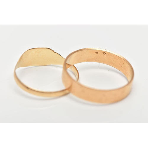 87 - TWO YELLOW METAL RINGS, the first a signet ring, stamped 9ct, ring size P, the second a plain polish... 