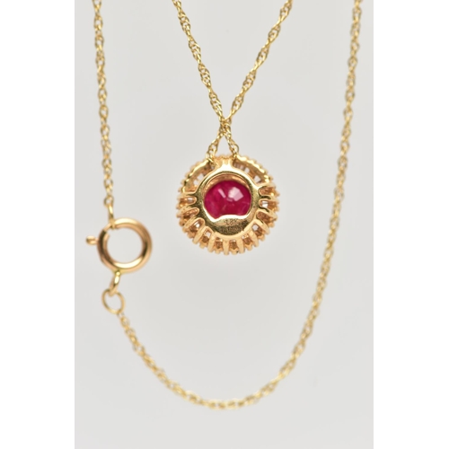 99 - AN 18CT YELLOW GOLD GLASS FILLED RUBY AND DIAMOND CLUSTER PENDANT, WITH YELLOW METAL CHAIN, the pend... 