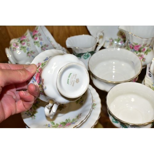 310 - A ROYAL ALBERT 'MOSS ROSE' PATTERN TEA SET TOGETHER WITH A ROYAL ALBERT 'CAPE BRETON ISLAND' PATTERN... 