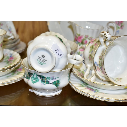 310 - A ROYAL ALBERT 'MOSS ROSE' PATTERN TEA SET TOGETHER WITH A ROYAL ALBERT 'CAPE BRETON ISLAND' PATTERN... 