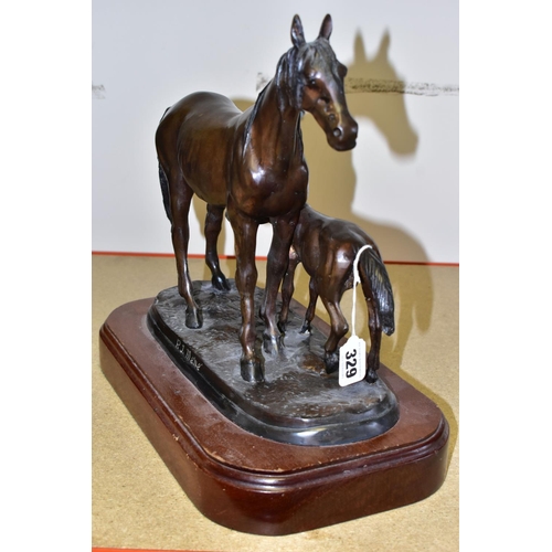 329 - A BRONZE SCULPTURE OF A MARE AND FOAL, on a wooden stand marked on base P.J. Méné , height 33cm (1)