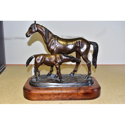 329 - A BRONZE SCULPTURE OF A MARE AND FOAL, on a wooden stand marked on base P.J. Méné , height 33cm (1)