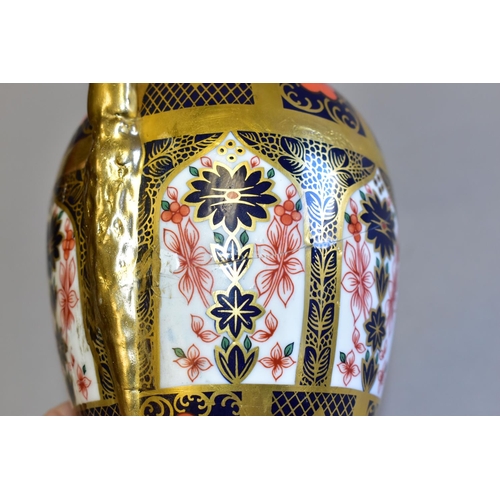 339 - A ROYAL CROWN DERBY IMARI 1128 SOLID GOLD BAND TWIN HANDLED VASE AND FIXED COVER, short pedestal and... 