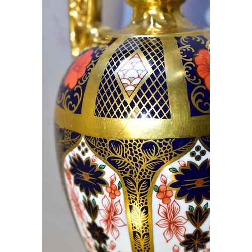 339 - A ROYAL CROWN DERBY IMARI 1128 SOLID GOLD BAND TWIN HANDLED VASE AND FIXED COVER, short pedestal and... 