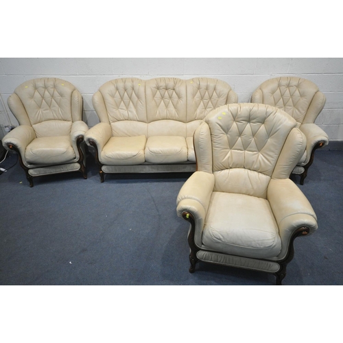 1300 - A GEMALINEA CREAM LEATHER FOUR PIECE LOUNGE SUITE, comprising a two seater settee, and three armchai... 