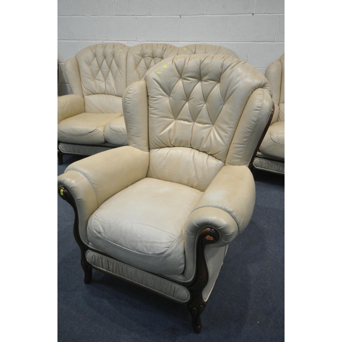 1300 - A GEMALINEA CREAM LEATHER FOUR PIECE LOUNGE SUITE, comprising a two seater settee, and three armchai... 