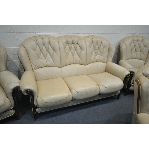 1300 - A GEMALINEA CREAM LEATHER FOUR PIECE LOUNGE SUITE, comprising a two seater settee, and three armchai... 