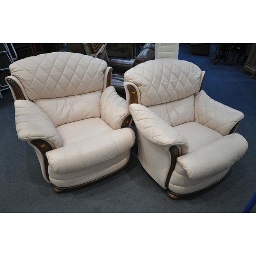 1303 - A PAIR OF LEATHER ARMCHAIRS