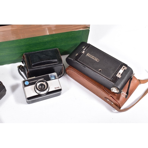 13 - A TRAY CONTAINING CAMERAS AND EQUIPMENT  including a Canon T70 film SLR fitted with a Tokina 28-70mm... 
