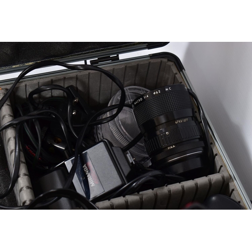 20 - A CASE AND A TRAY CONTAINING A CANON EOS 100 FILM SLR fitted with a EF mk2 28-80mm f3.5 lens, a Sigm... 