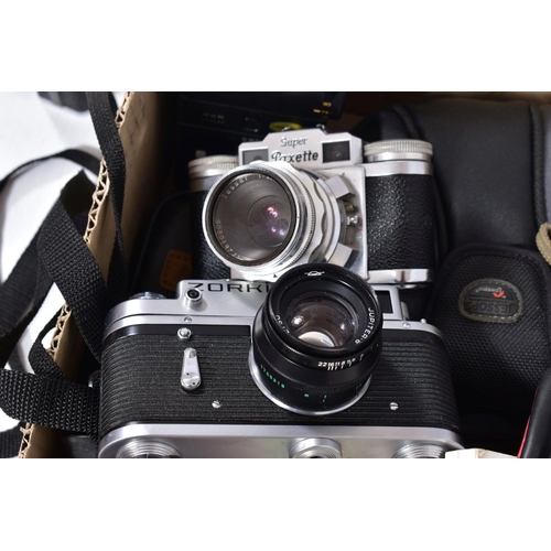 25 - TWO TRAYS AND A CASE CONTAINING CAMERA EQUIPMENT including a Canon T70 Film SLR body, a Braun Super ... 