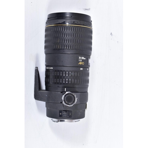 32 - FOUR CANON AND CANON FIT ZOOM LENSES comprising of a Canon 70-300 f4 EF IS USM lens, a Sigma 70-200 ... 