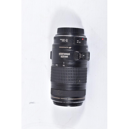32 - FOUR CANON AND CANON FIT ZOOM LENSES comprising of a Canon 70-300 f4 EF IS USM lens, a Sigma 70-200 ... 