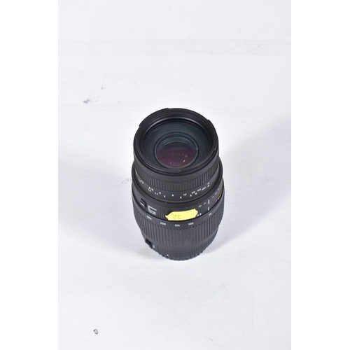 32 - FOUR CANON AND CANON FIT ZOOM LENSES comprising of a Canon 70-300 f4 EF IS USM lens, a Sigma 70-200 ... 