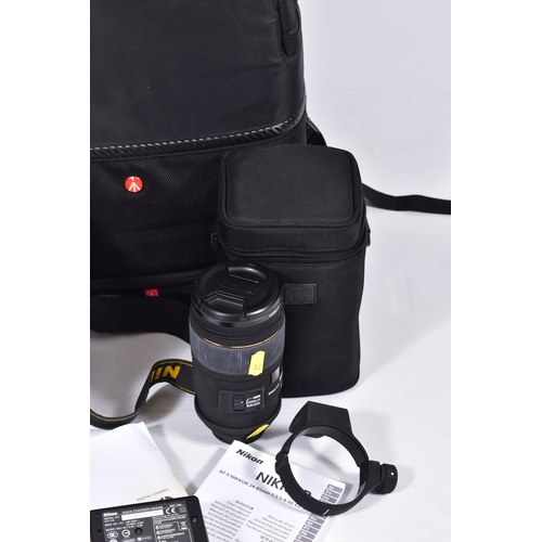33 - A MANFROTTO CAMERA RUCK SACK CONTAINING A NIKON D90 DIGITAL SLR CAMERA with charger,  cable and one ... 