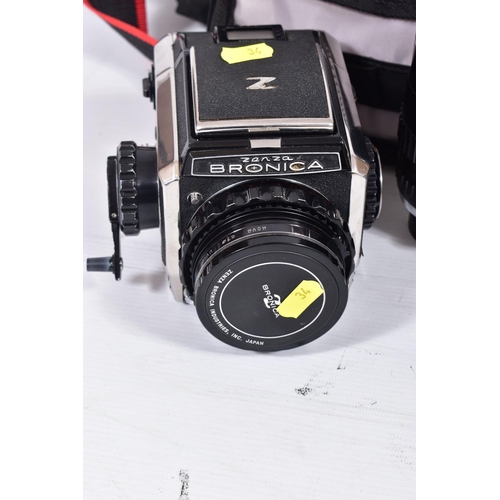 34 - A ZENZA BRONICA MODEL C MEDIUM FORMAT SLR CAMERA with a Zenzanon MC 200mm f3.5 lens, a Nikkor PC 75m... 