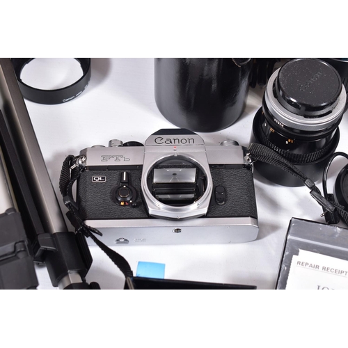 4 - A CAMERA BAG CONTAINING A CANON FTb QL FILM SLR CAMERA , a FD SSC 50mm f1.4 lens, a  FD 35mm f2 in c... 