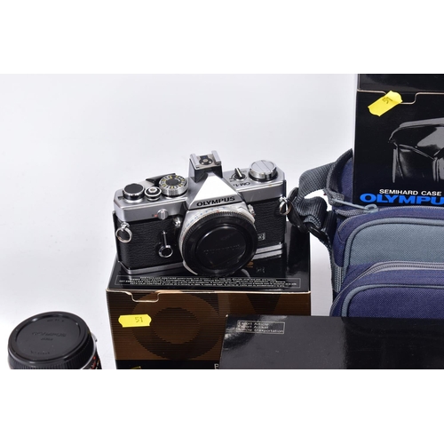 51 - OLYMPUS FILM SLR CAMERAS AND ACCESSORIES comprising of a boxed OM1N body, a boxed OM10 fitted with a... 
