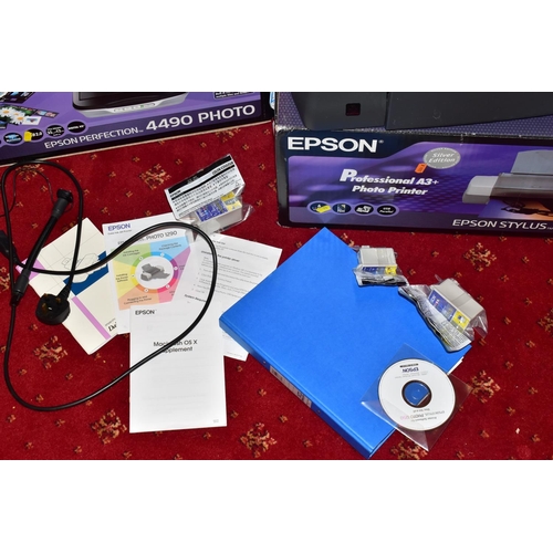 53 - AN EPSON STYLUS PHOTO 1290 PROFESSIONAL A3 PRINTER in box with spare cartridges, manual, disc and an... 