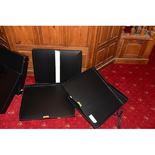 54 - FOUR FIBRE SHELL FOLIO CASES appear to A3 in size and of various depths with closing straps