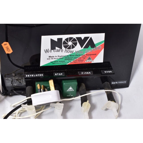 56 - A NOVA SPRHC 1 QUAD PRINT PROCESSOR with fluid inputs and separate sections for Develop, Stop, Fix a... 