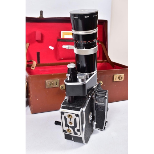 66 - A CASED BOLEX PAILLARD H16 REFLEX CINE CAMERA fitted with a Kern Vario-Switar 18-86mm f 2.5 lens. a ... 