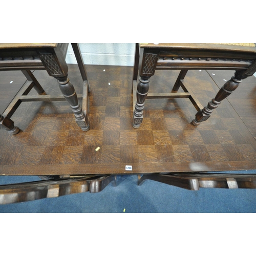 1192 - AN FRENCH BRETON DRAW LEAF DINING TABLE, on a trestle base and stretcher, extended length 260cm x cl... 