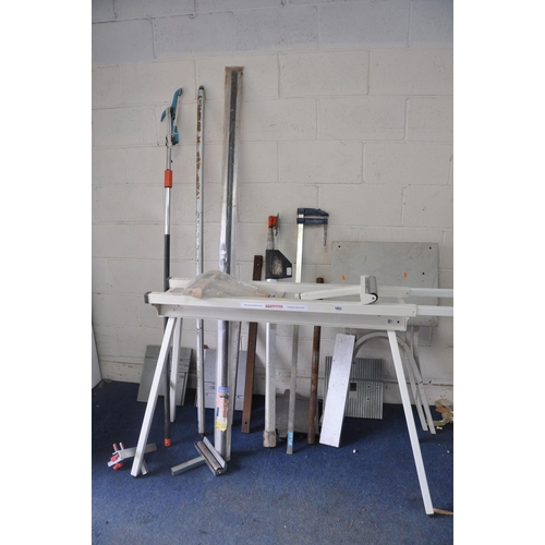 1053 - AN AXMINSTER TOOLS FOLDING MITRE SAW STAND with two roller attachments (incomplete) 110cm long x 92c... 