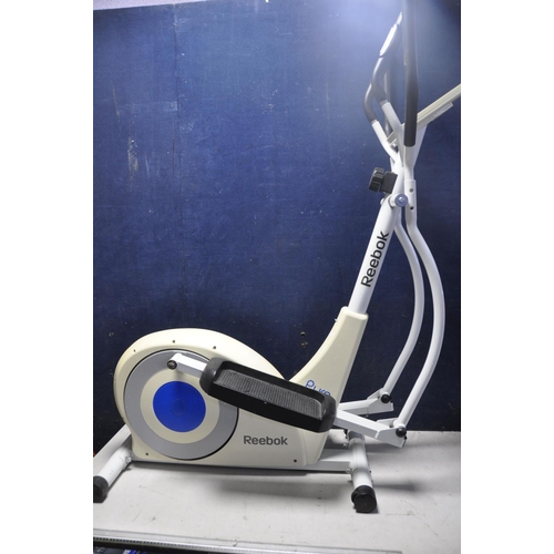 1055 - A REEBOK PURE CROSSTRAINER along with a Delta explorer spin bike (2)