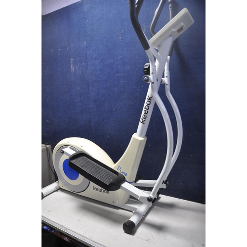 1055 - A REEBOK PURE CROSSTRAINER along with a Delta explorer spin bike (2)