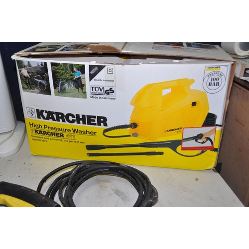 1078 - A KARCHER 411 PRESSURE WASHER with two hoses and lances in original box, along with a Waltham haloge... 