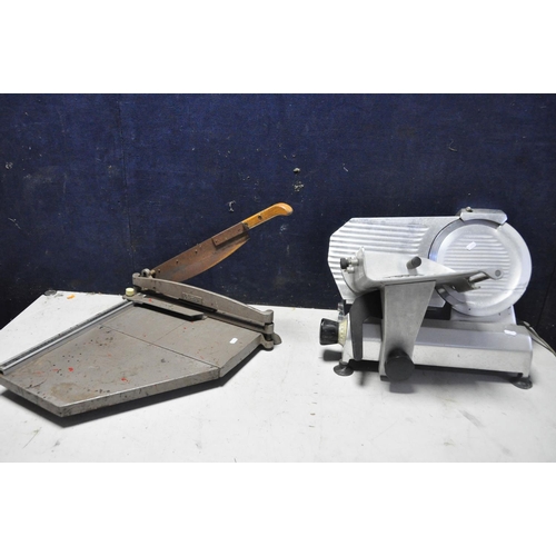 1083 - CUTTING EQUIPMENT to include an electric meat slicer (brand and model UNKNOWN) (PAT pass and working... 