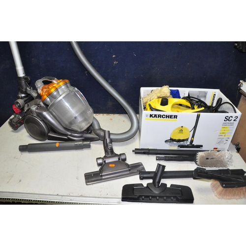 1092 - A KARCHER SC2 STEAM CLEANER in original box with attachments along with a Dyson DC19 vacuum cleaner ... 